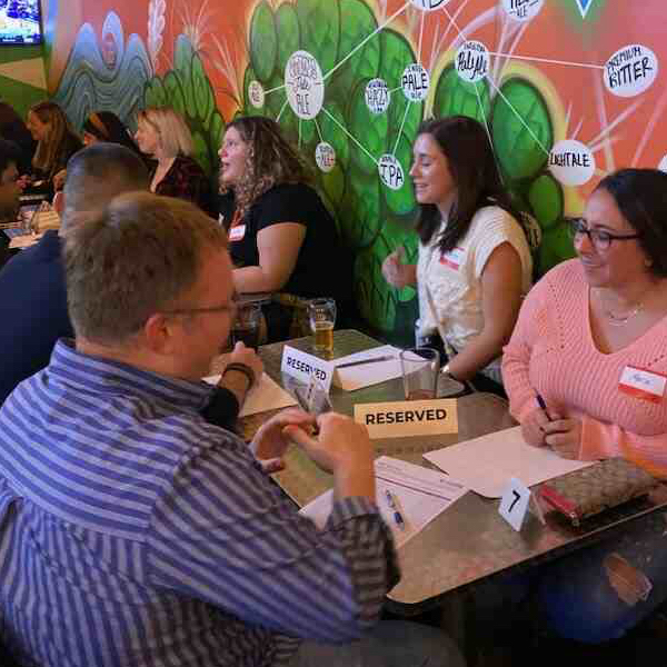 Attendees at a MD speed dating event